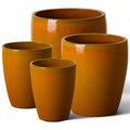 Emissary Bright Orange Ceramic Round Planters Set of 4 with Drainage Holes (12in., 14in., 15.5in., 21in.)