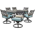 Hanover Montclair 7-Piece Outdoor Dining Set with 6 Swivel Rockers and Blue Cushions