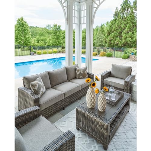Signature Design by Ashley Oasis Court Outdoor Sofa Chair Table Set 4-Piece with Cushions and Pillows Grey