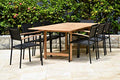 Amazonia Kenneth 9-Piece Extendable Patio Dining Set Durable Teak Wood Black Sling Chairs Black