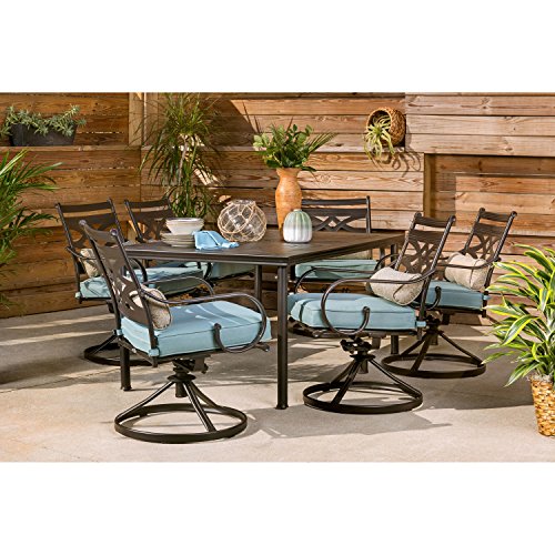 Hanover Montclair 7-Piece Outdoor Dining Set with 6 Swivel Rockers and Blue Cushions