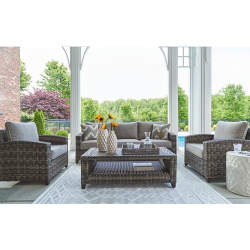 Signature Design by Ashley Oasis Court Outdoor Sofa Chair Table Set 4-Piece with Cushions and Pillows Grey