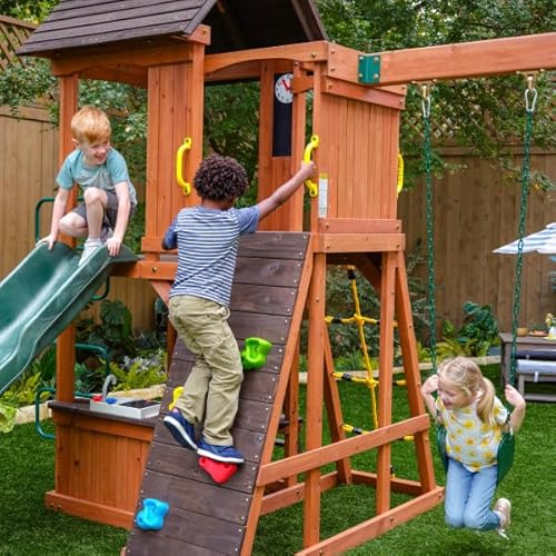 KidKraft Raptor Trail Wooden Swing Set with Twisty Ladder, Wavy Slide, Rock Wall Brown